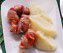 Code di aragosta bardate con pancetta